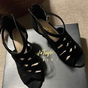Black suede 7 m dress sandal with ankle strap and zipper in back of heel